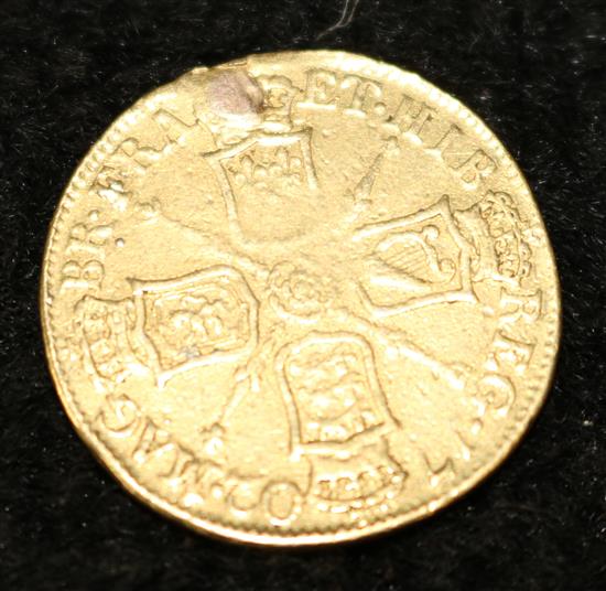 A Queen Anne gold guinea, 1702,